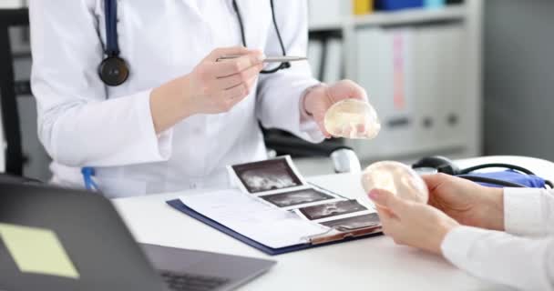 Doctor Woman Hold Silicone Breast Implant Close Slow Motion Plastic — Vídeo de Stock