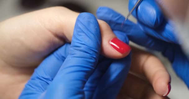 Manicurist Makes Manicure Red Varnish Hands Close Gel Polish Cuticle — Vídeos de Stock