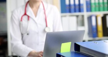 Medical doctor operator conducts remote consultation of patient. Telemedicine concept
