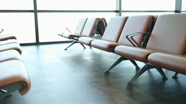 Location in airport terminal. Leather light brown armchairs at station station concept