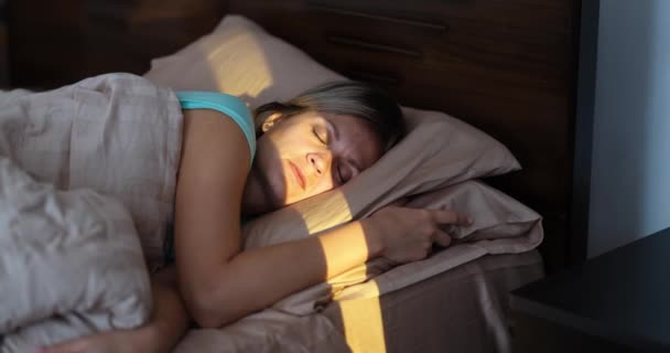 Sunbeam Shining Young Sleeping Woman Bedroom Movie Morning Awakening Concept — стоковое видео