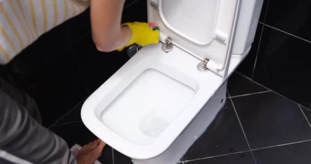 Woman Yellow Gloves Washes White Toilet Bowl Rag Close Toilet — Vídeos de Stock