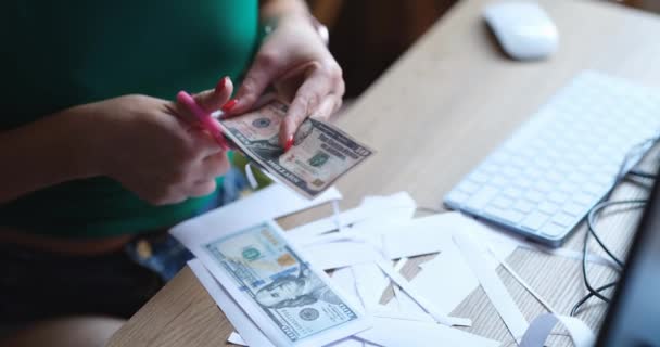 Woman Sitting Table Cuts Out Fake Dollars Scissors Close Counterfeit — Αρχείο Βίντεο