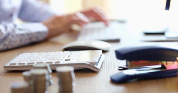 Woman Sitting Table Typing Keyboard Counting Calculator Close Bank Employee — Stock Video