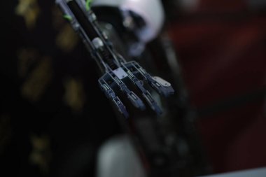Artificial robot arm and robotic prosthesis closeup. Creation of bionic prosthetic hands concept