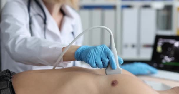 Female Doctor Examines Patient Heart Using Modern Ultrasound Echocardiography Equipment — Vídeo de Stock