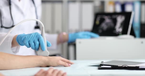 Ultrasound Technician Examines Wrist Hand Bones Young Woman Fragment Study — Stockvideo