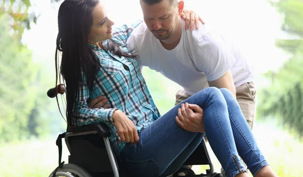 Man Helps Disabled Woman Wheelchair Help Support Rehabilitation Disabled — Stockfoto