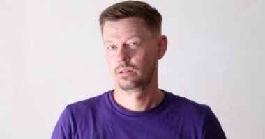 A strange man threatens with a knife, close-up. Melee attack. Danger from aggression