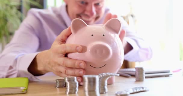 Man Office Irons Pink Piggy Bank Close Short Term Deposit — Stock video
