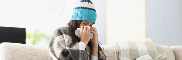 Sick Woman Warm Hat Blowing Her Nose Paper Napkin Home — Stock Photo, Image