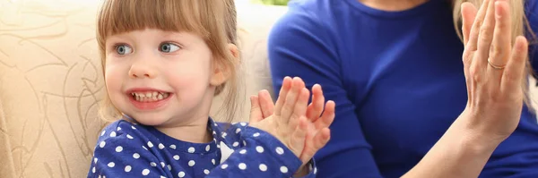 Cute Little Girl Plays Mom Claps Hands Home Games Young — стоковое фото