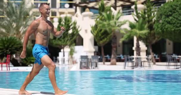 Happy Joyful Sports Man Jumping Blue Pool — Wideo stockowe