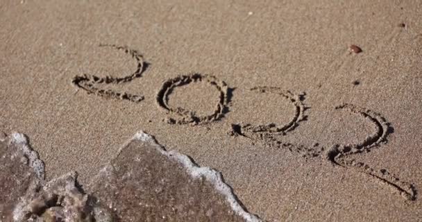 Inscription Sand 2022 Washed Away Sea Wave End 2022 New — Αρχείο Βίντεο