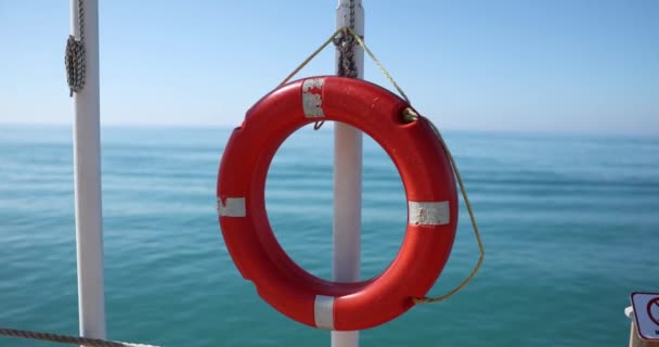 Orange Lifebuoy Weights Mast Backdrop Sea Safety Caution Swimming Sea — 图库视频影像