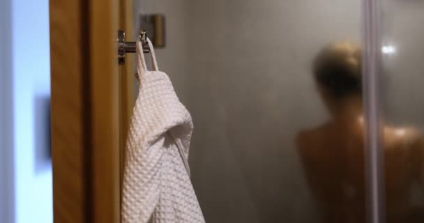 Naked Woman Washing Shower White Bathrobe Hook Evening Morning Body — Stockvideo