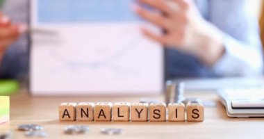 Remote work person shows graph to camera. Making an online report and video call and conference with demonstration of documents and graphs