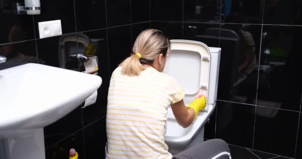 Woman Sitting Washes Toilet Bowl Rag Close Home Bathroom Cleaning — Stock Video