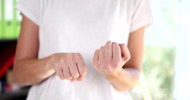 Female hand showing gesture with hand fuck holding middle finger. Aggressive angry negative gesture