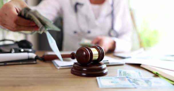 Doctor Holding Dollar Money Court Gavel Medical Crime Doctors Bribe — Stock Video