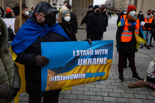 Berlin, Germany - February 19 2022: The demonstration in front of the Brandenburg Gate in support of Ukraine and against the Russian aggression. Protesters against Russia's war in Donbas, Ukraine.
