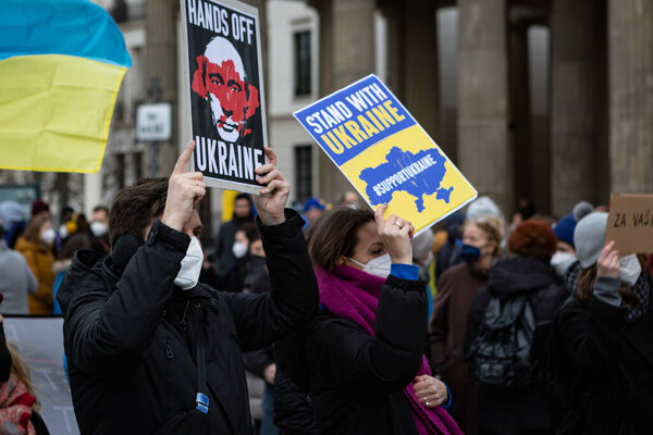 Berlin, Germany - February 19 2022: The demonstration in front of the Brandenburg Gate in support of Ukraine and against the Russian aggression. Protesters against Russia's war in Donbas, Ukraine.