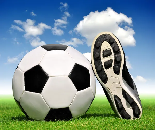 Soccer ball and shoes — Stock Photo, Image