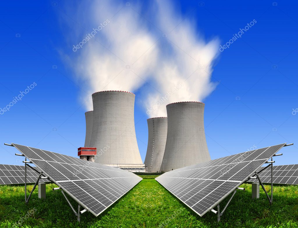 Solar energy panels before a nuclear power plant Stock Photo by ©vencav