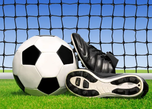 Soccer ball and shoes — Stock Photo, Image