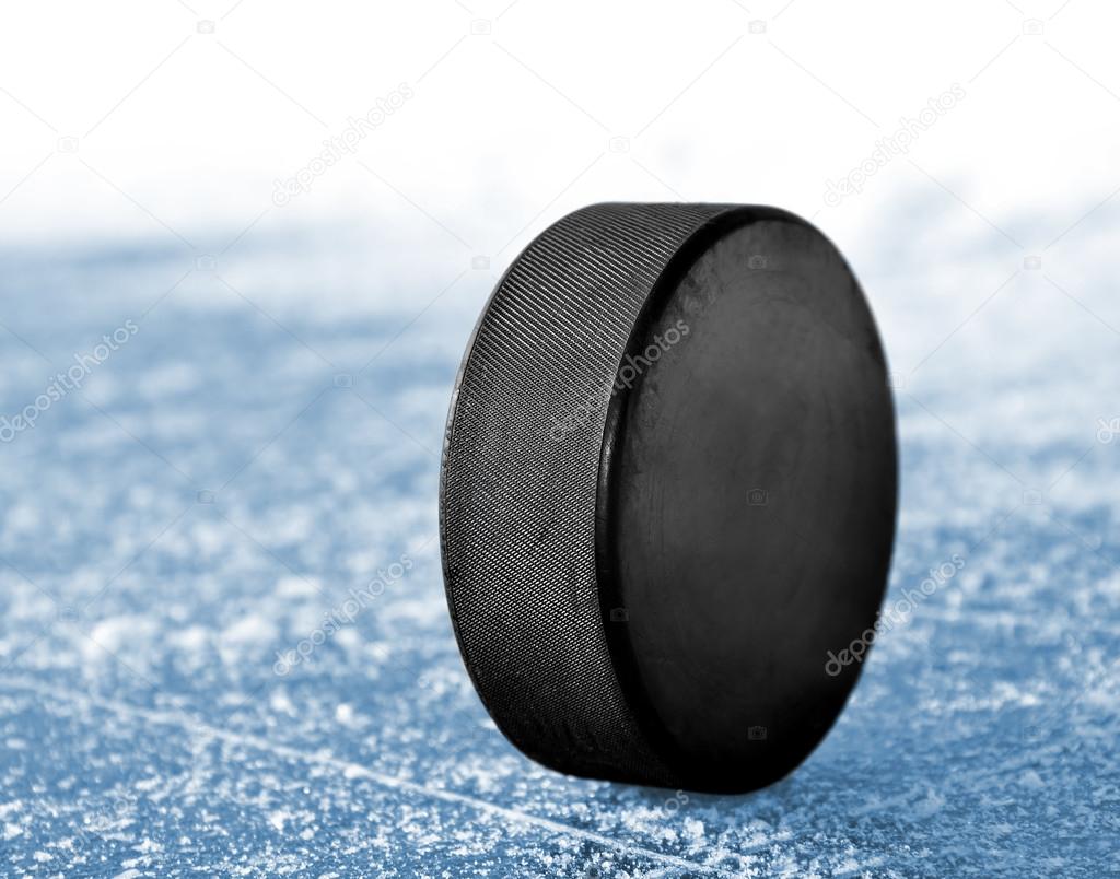 Black hockey puck — Stock Photo © vencav 16310837