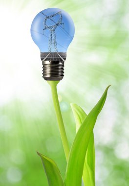 Power line with solar panel in the bulb clipart