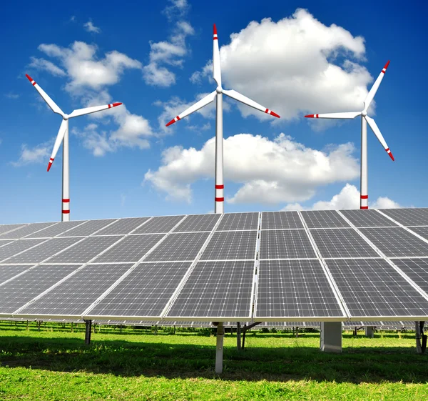 Solar energy panels and wind turbine — Stock Photo, Image