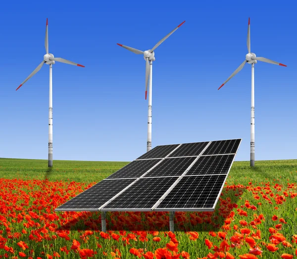 Solární panely a větrná turbína — Stock fotografie