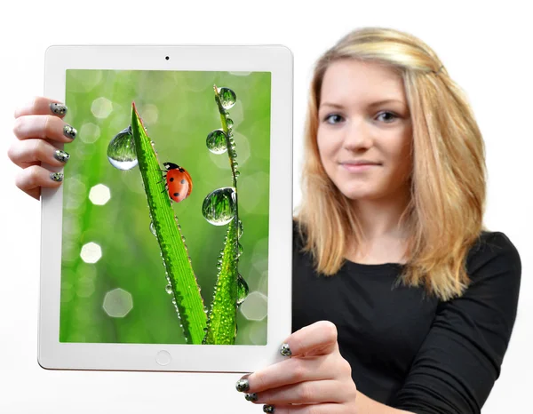 Meninas segurando um computador tablet — Fotografia de Stock