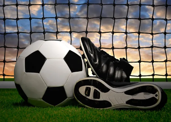 Soccer ball and shoes — Stock Photo, Image