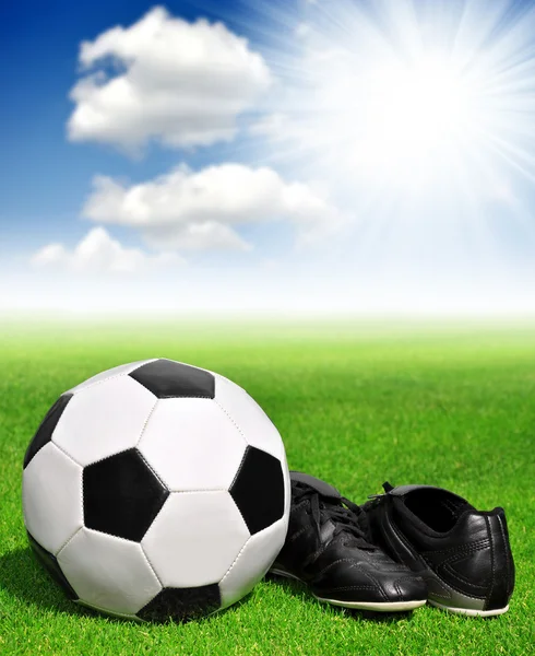 Soccer ball and shoes — Stock Photo, Image