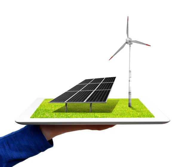 Hand holding a tablet with a wind turbine and solar panel — Stock Photo, Image