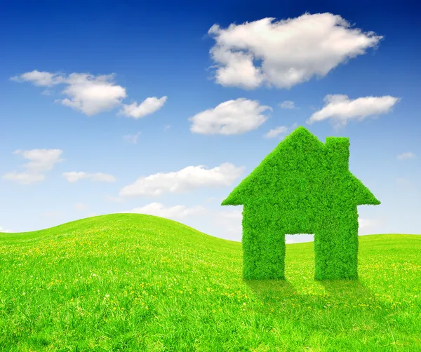 Groen gras huis symbool — Stockfoto