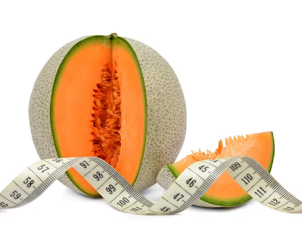 Cantaloupe melon with measuring tape — Stock Photo, Image