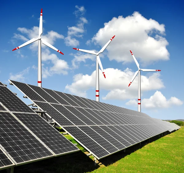 Solar energy panels and wind turbine — Stock Photo, Image