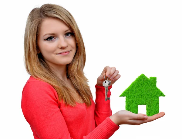 Girls holding in hands green house — Stock Photo, Image