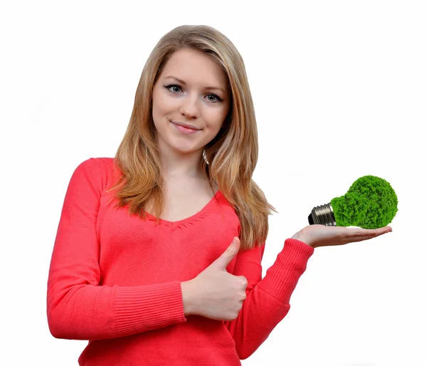 Chica sosteniendo en la mano bombilla de energía ecológica — Foto de Stock