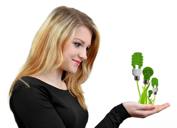 Girl holding in hand eco energy bulbs — Stock Photo, Image