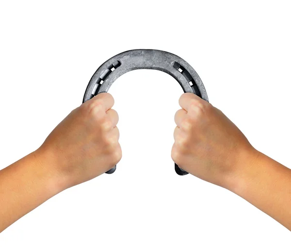 Hands holding horseshoe — Stock Photo, Image