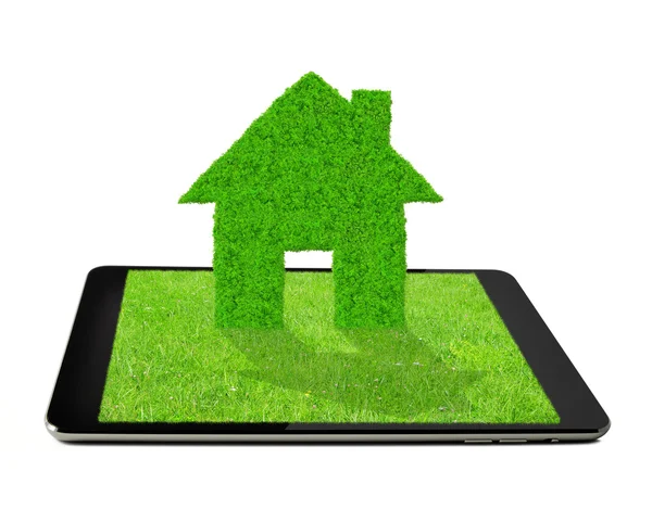 Tablet with green house — Stock Photo, Image