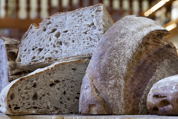 Eco-friendly products on the market stall. Slices of rye bread — Stock Photo, Image