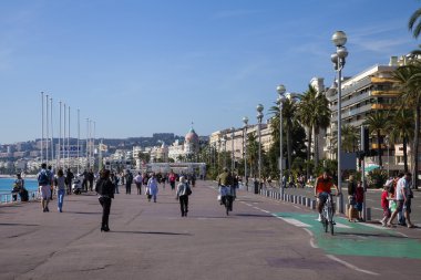 France , Cote d'Azur . Nice, October 16, 2013. View of the Promenade des Anglais sunny autumn day