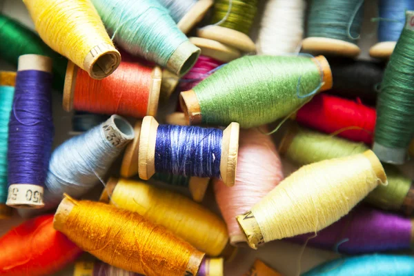 Spools of thread of different colors — Stock Photo, Image