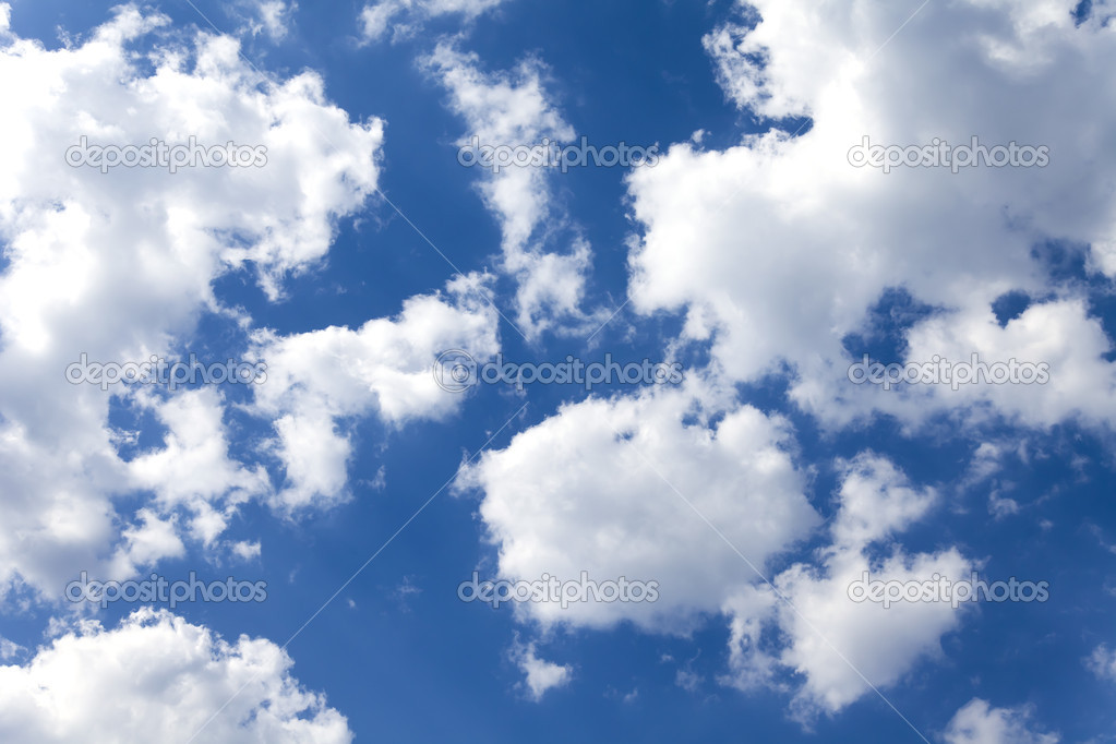 Heavenly landscape: clouds on a bright blue sky