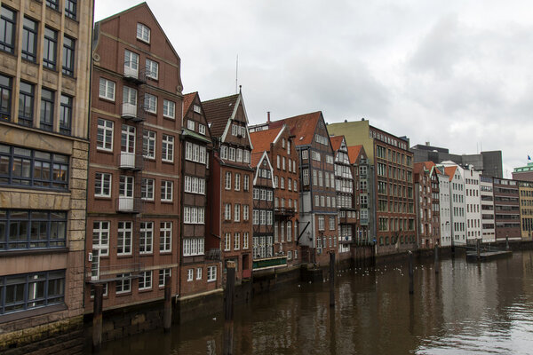 Hamburg, Germany , February 19, 2013. View of the old houses on the banks of the Alster river channels on a cloudy winter day.